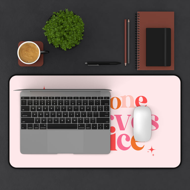 everyone deserves a voice colorful desk mat