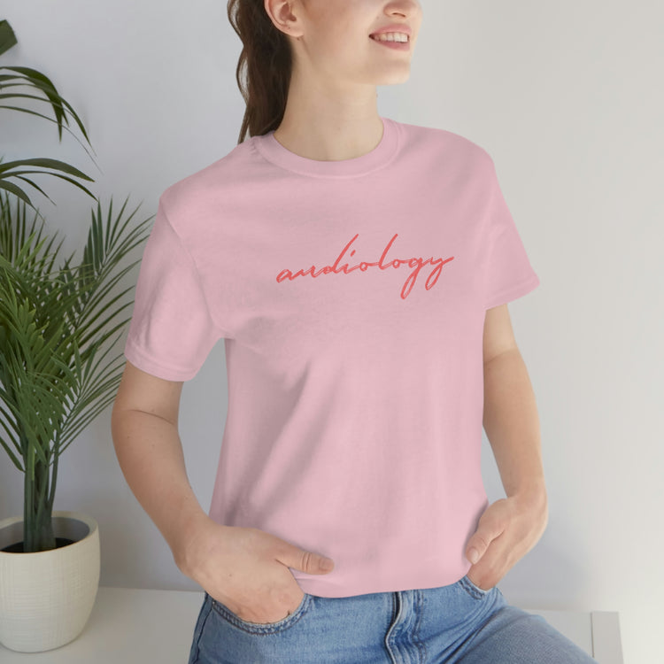 pink cursive audiology short sleeve tee