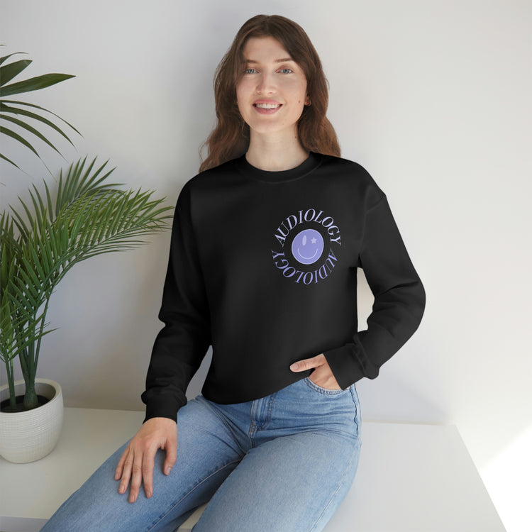 audiology purple smiley crewneck