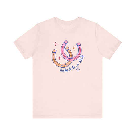 lucky to be an AUD horseshoe short sleeve tee